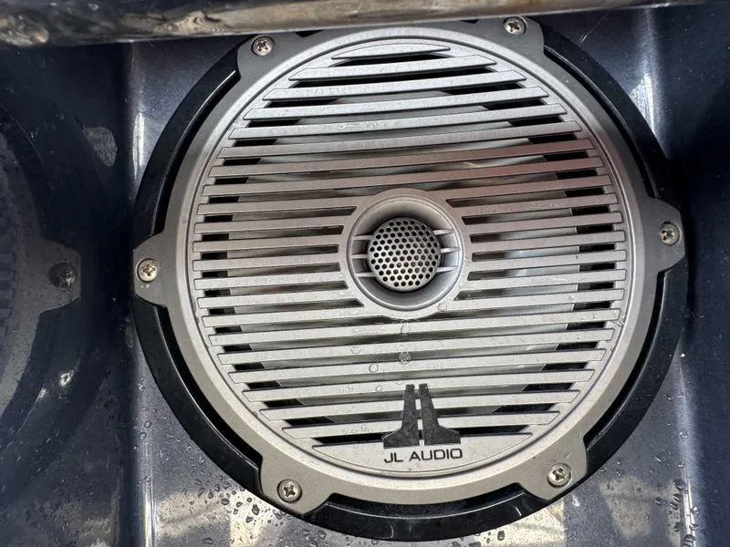 Slide: The Image of JL Audio speaker on 2016 VanDutch 30 boat, featuring a sleek metallic grille design. - 36