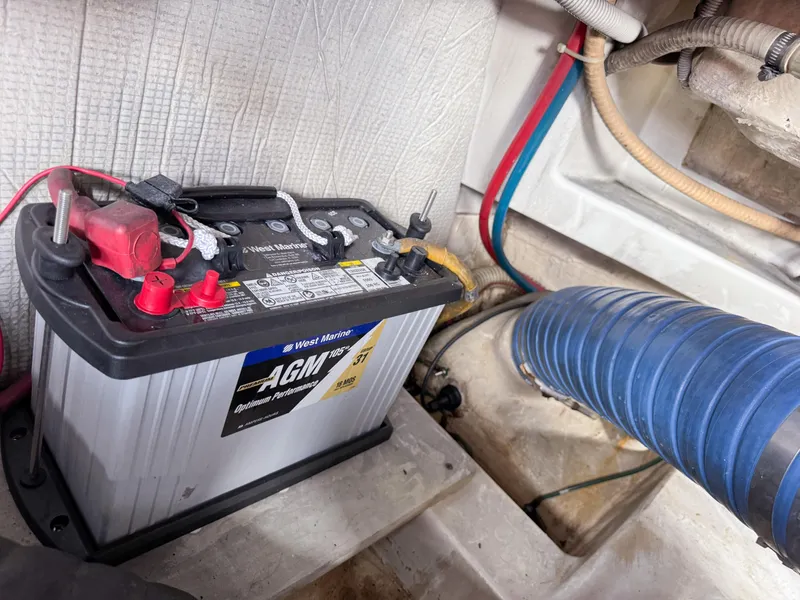 Slide: The Image of Marine battery setup in a 2016 VanDutch 30 boat, featuring AGM technology and wiring. - 40