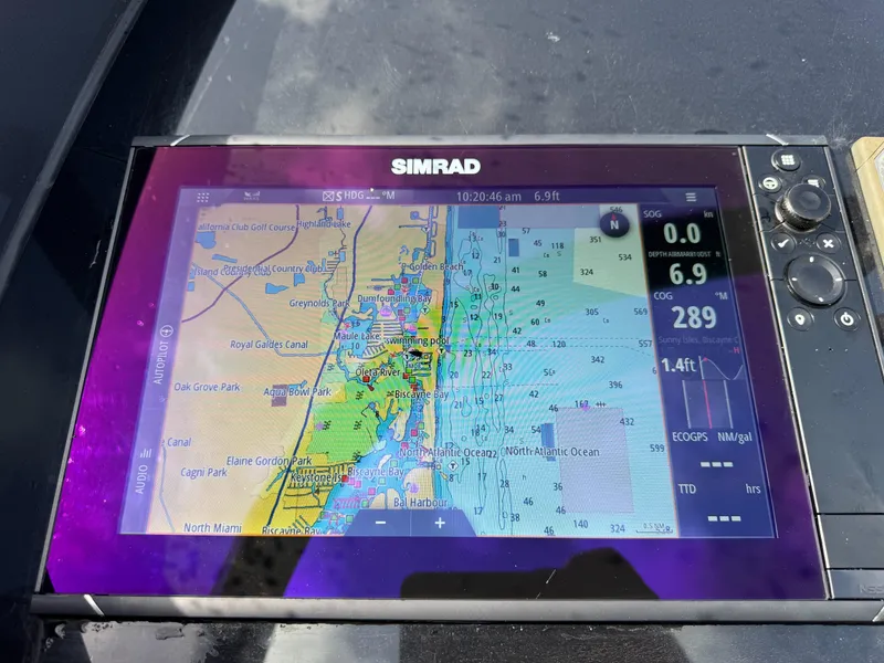 Slide: The Image of Simrad navigation display on 2016 VanDutch 30, showing nautical map and data. - 7