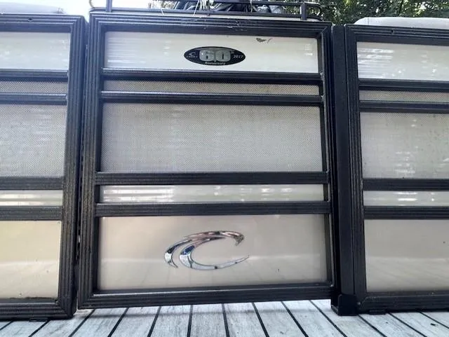 Slide: The Image of 2017 Crest Caribbean 250 L pontoon boat panel with logo and design details. - 4