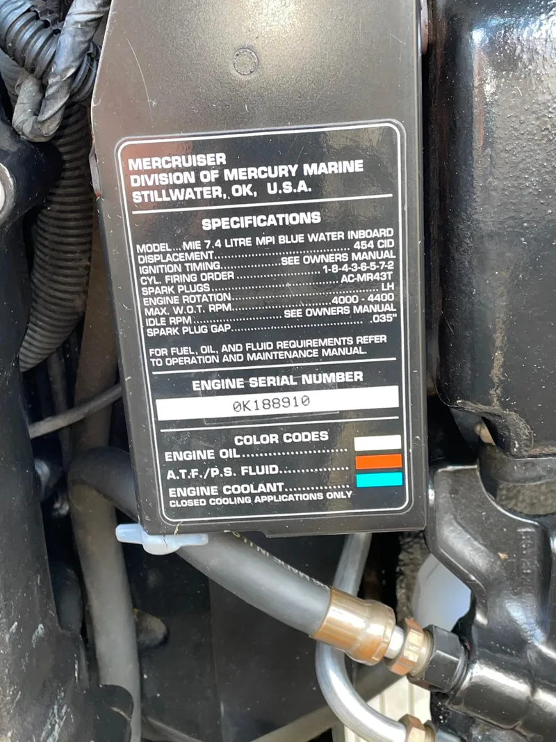 Slide: The Image of Engine specifications label on a 1997 Sea Ray 330 Express boat. - 24