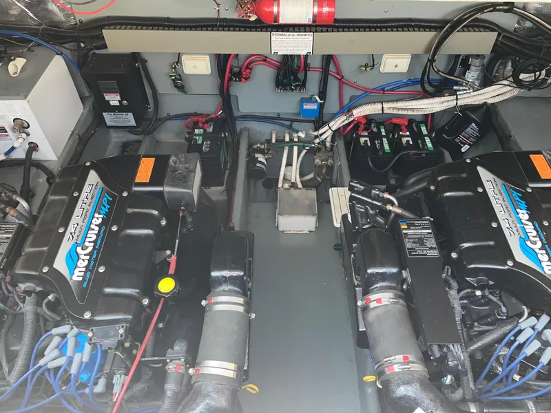 Slide: The Image of Engine compartment of a 1997 Sea Ray 330 Express with twin MerCruiser engines. - 26