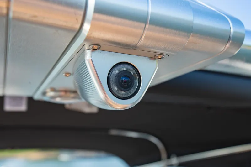 Slide: The Image of Close-up of a camera on a 2021 MasterCraft X22 boat. - 25