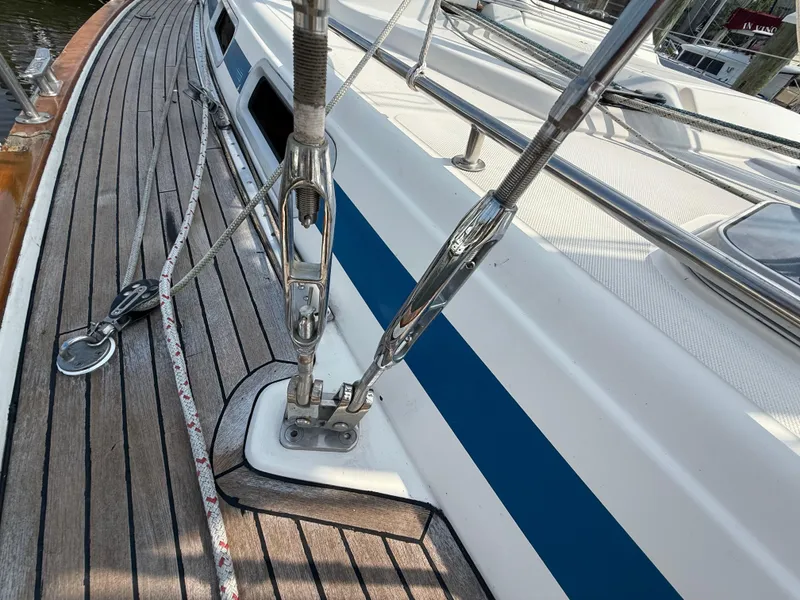 Slide: The Image of Deck of 1999 Bavaria 42 Ocean sailboat with rigging and wooden finish. - 10