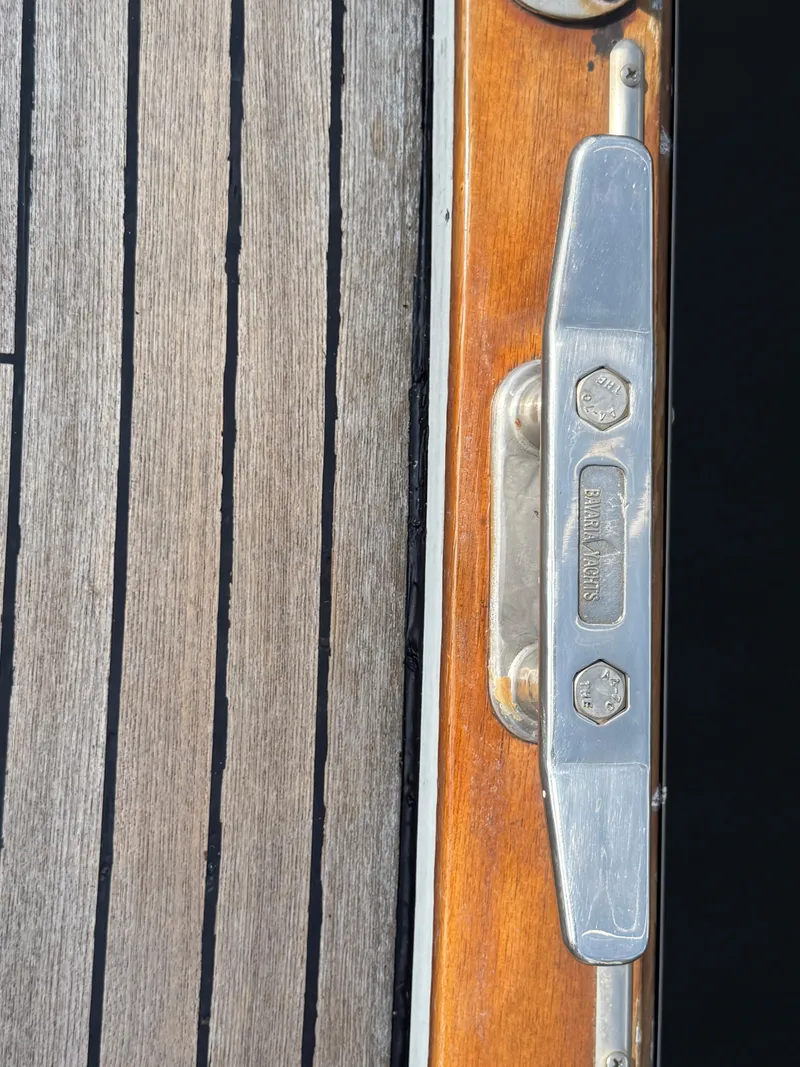Slide: The Image of Close-up of Bavaria 42 Ocean 1999 yacht deck with metal fitting. - 19