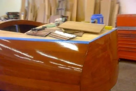 Slide: The Image of Restoration of 1931 Hacker-Craft 26 Dolphin boat with wooden finish in workshop. - 103