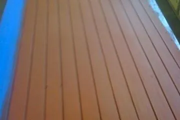 Slide: The Image of Wooden deck of a 1931 Hacker-Craft 26 Dolphin boat, showcasing classic craftsmanship. - 131