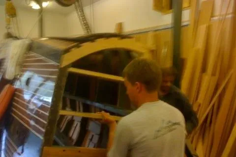 Slide: The Image of Restoration of 1931 Hacker-Craft 26 Dolphin boat in workshop setting. - 157