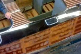 Slide: The Image of 1931 Hacker-Craft 26 Dolphin boat with polished wood and sleek design. - 158