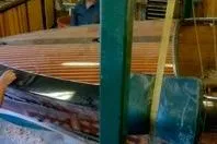 Slide: The Image of 1931 Hacker-Craft 26 Dolphin boat under restoration in workshop. - 162