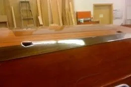 Slide: The Image of 1931 Hacker-Craft 26 Dolphin wooden boat in workshop setting. - 172