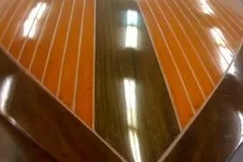 Slide: The Image of Close-up of 1931 Hacker-Craft 26 Dolphin wooden boat deck with polished finish. - 186