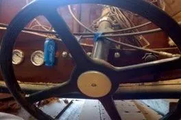 Slide: The Image of Steering wheel of a 1931 Hacker-Craft 26 Dolphin boat, showcasing vintage design. - 192