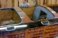 Slide: The Image of 1931 Hacker-Craft 26 Dolphin boat under restoration in workshop. - 218