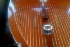 Slide: The Image of 1931 Hacker-Craft 26 Dolphin boat with polished wooden deck and chrome details. - 23