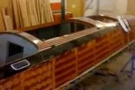 Slide: The Image of 1931 Hacker-Craft 26 Dolphin wooden boat in workshop setting. - 232