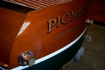 Slide: The Image of 1931 Hacker-Craft 26 Dolphin boat, wooden finish, "Pioneer" name on stern. - 237