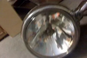 Slide: The Image of 1931 Hacker-Craft 26 Dolphin headlight, vintage boat accessory, reflective surface. - 251