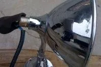 Slide: The Image of Close-up of a vintage chrome spotlight from a 1931 Hacker-Craft 26 Dolphin boat. - 48