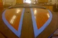 Slide: The Image of 1931 Hacker-Craft 26 Dolphin boat with polished wooden deck and sleek design. - 55