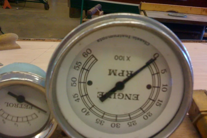 Slide: The Image of Close-up of vintage 1931 Hacker-Craft 26 Dolphin engine RPM gauge. - 58