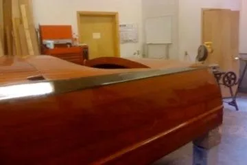 Slide: The Image of 1931 Hacker-Craft 26 Dolphin wooden boat in workshop setting. - 61