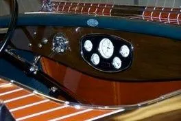 Slide: The Image of Dashboard of a 1931 Hacker-Craft 26 Dolphin boat with vintage gauges and wooden finish. - 69