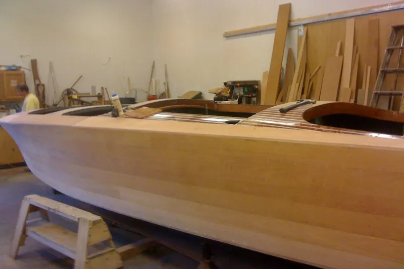 Slide: The Image of Restoration of a 1931 Hacker-Craft 26 Dolphin wooden boat in a workshop. - 91