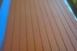 Slide: The Image of Wooden deck of a 1931 Hacker-Craft 26 Dolphin boat, showcasing classic craftsmanship. - 99