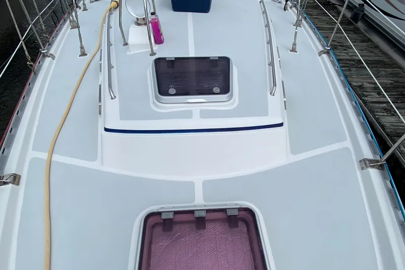 Slide: The Image of Deck of 2007 Valiant 50 sailboat with hatches and railing. - 3