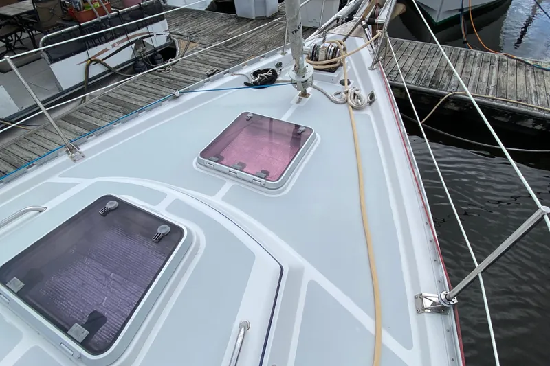 Slide: The Image of Deck of 2007 Valiant 50 sailboat with hatches, docked at marina. - 4