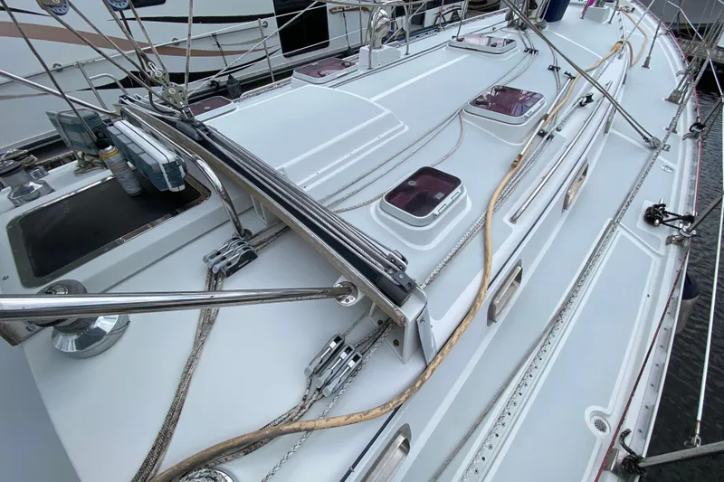 Slide: The Image of Valiant 50 sailboat deck, 2007 model, featuring rigging and hatches. - 6
