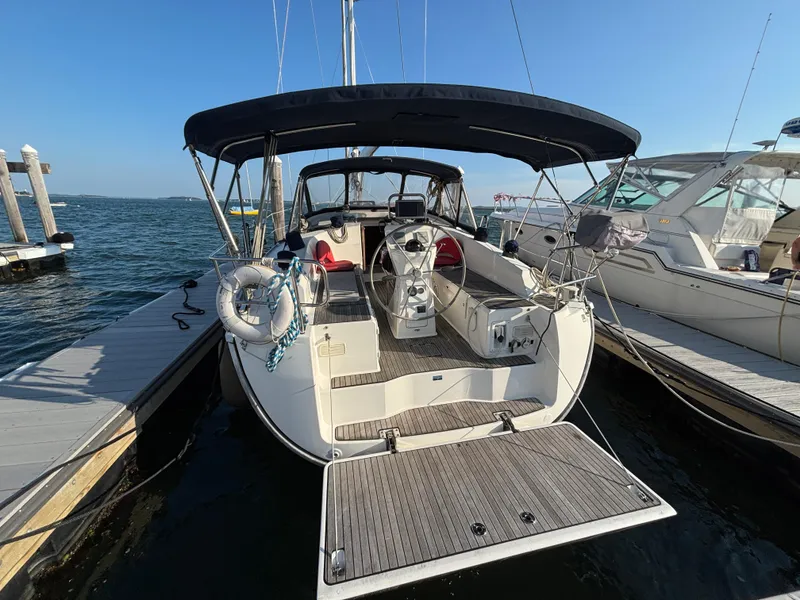 Slide: The Image of Bavaria 36 Cruiser 2014 docked, featuring spacious cockpit and modern design. - 20