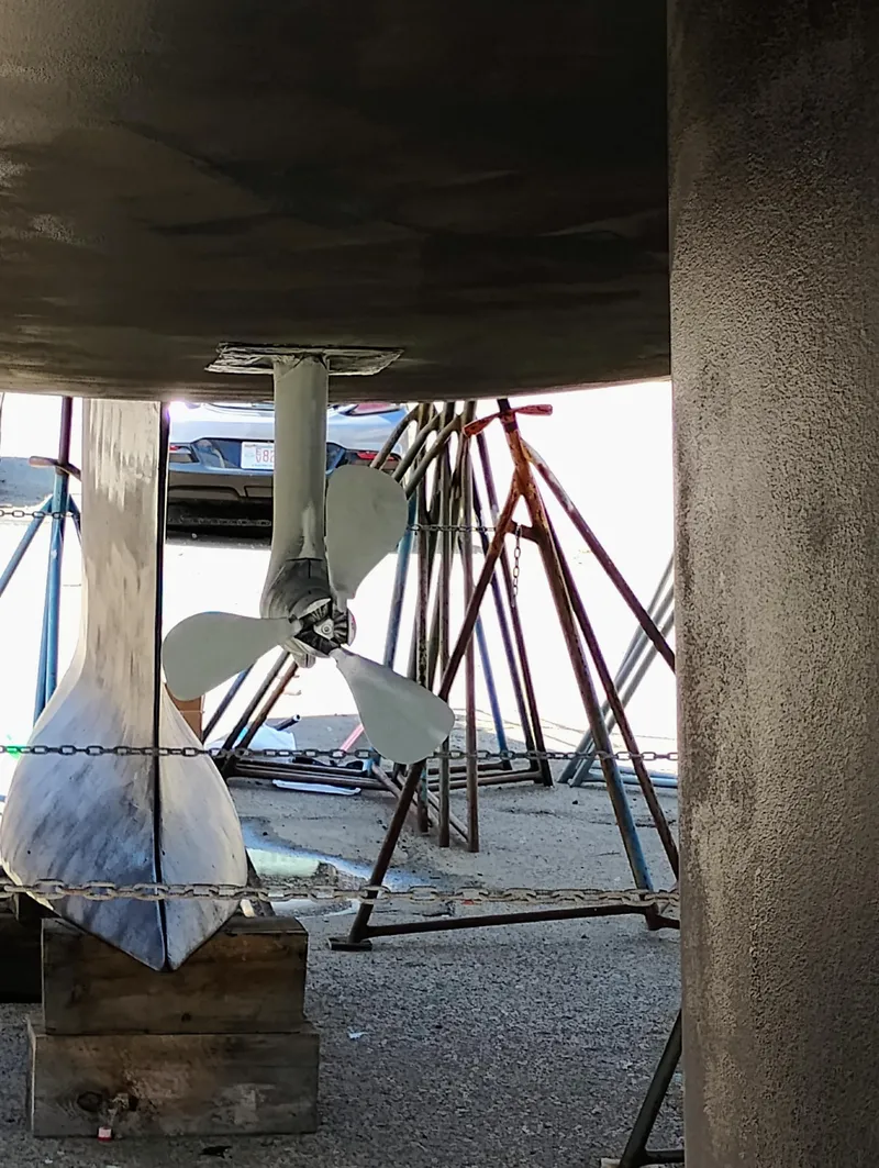 Slide: The Image of Underwater view of Bavaria 36 Cruiser 2014 propeller and keel in dry dock. - 33