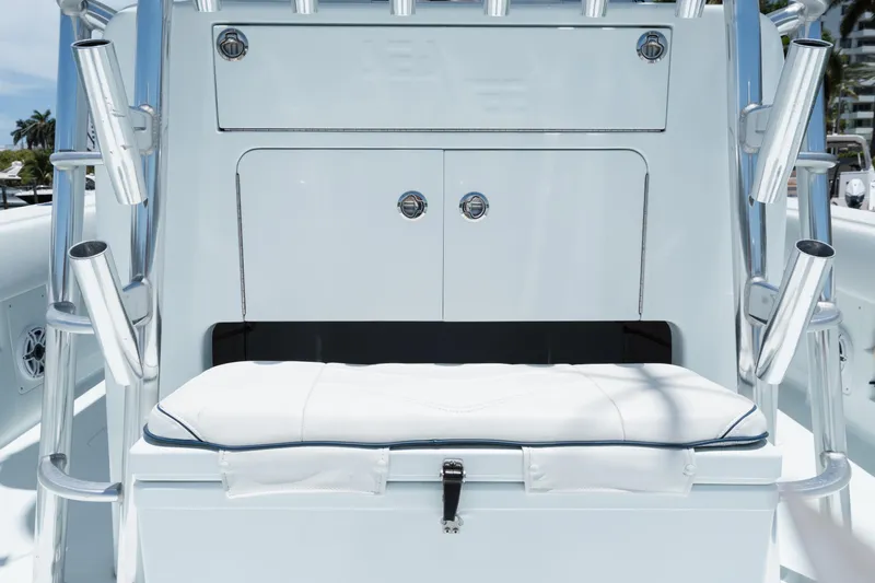 Slide: The Image of 2017 SeaVee Z39 boat interior with rod holders and cushioned seating. - 15