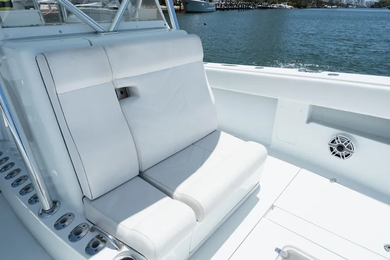 Slide: The Image of 2017 SeaVee Z39 boat with white seating and ocean view. - 17