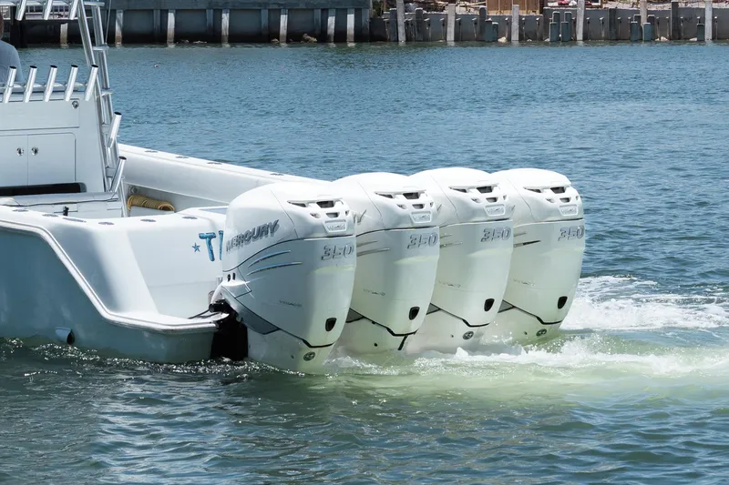 Slide: The Image of 2017 SeaVee Z39 boat with four Mercury 350 outboard engines on water. - 7