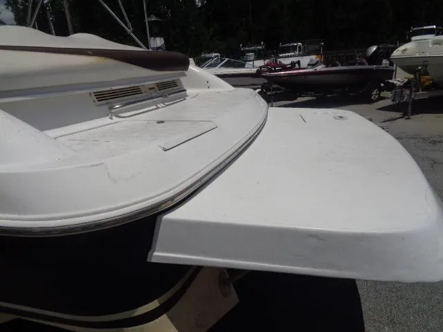 Slide: The Image of 2003 Four Winns 220 Horizon boat stern view with swim platform. - 7