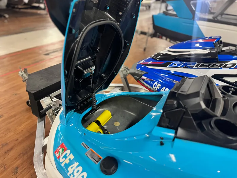 Slide: The Image of 2022 Yamaha WaveRunner FX SVHO with open storage compartment on display. - 24