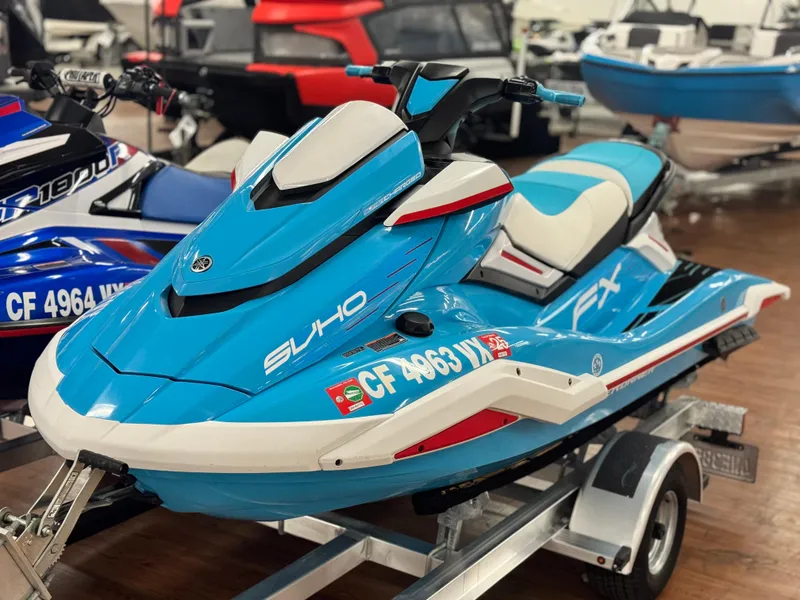 Slide: The Image of 2022 Yamaha WaveRunner FX SVHO in blue on a trailer, displayed indoors. - 5