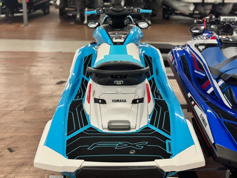 Slide: The Image of 2022 Yamaha WaveRunner FX SVHO in showroom, showcasing sleek design and vibrant colors. - 9