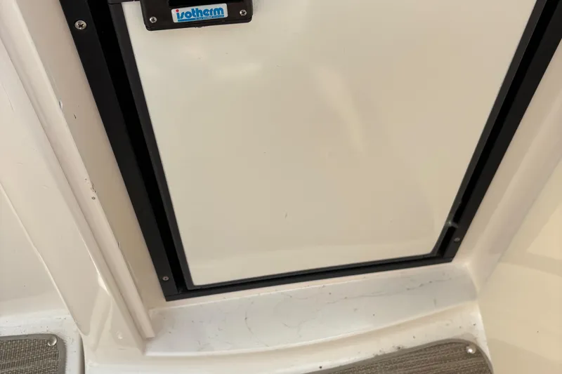 Slide: The Image of Cabin door of 2005 Chaparral Signature 330 boat with Isotherm label. - 10