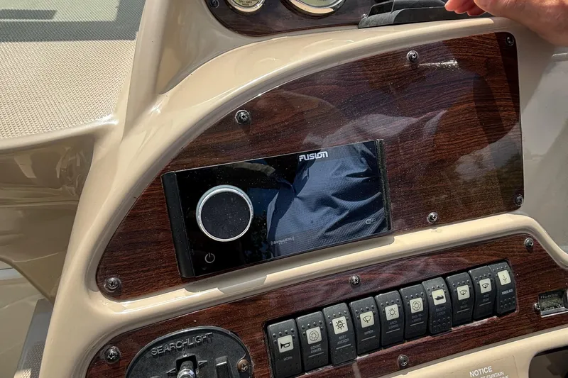 Slide: The Image of Control panel of a 2005 Chaparral Signature 330 boat with Fusion audio system. - 8