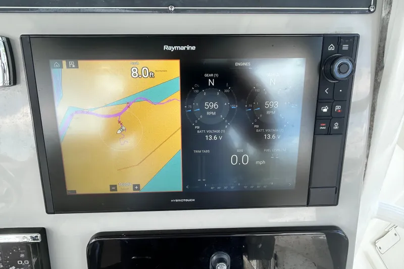 Slide: The Image of Raymarine display on 2017 Boston Whaler 330 Outrage showing navigation and engine data. - 21