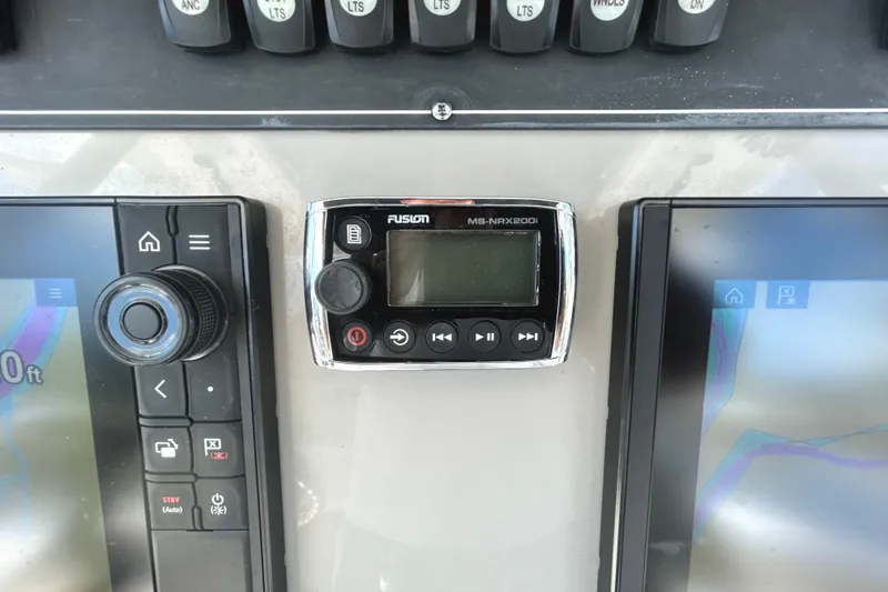 Slide: The Image of Control panel of a 2017 Boston Whaler 330 Outrage boat with Fusion MS-NRX200i. - 22