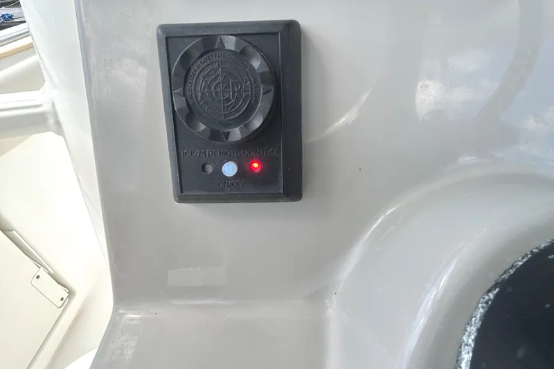 Slide: The Image of Control panel on a 2017 Boston Whaler 330 Outrage boat dashboard. - 35