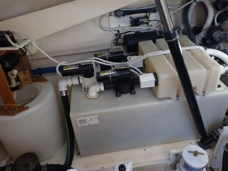 Slide: The Image of Engine room of 2009 Tiara Yachts 4300 Sovran, showcasing mechanical components and systems. - 17