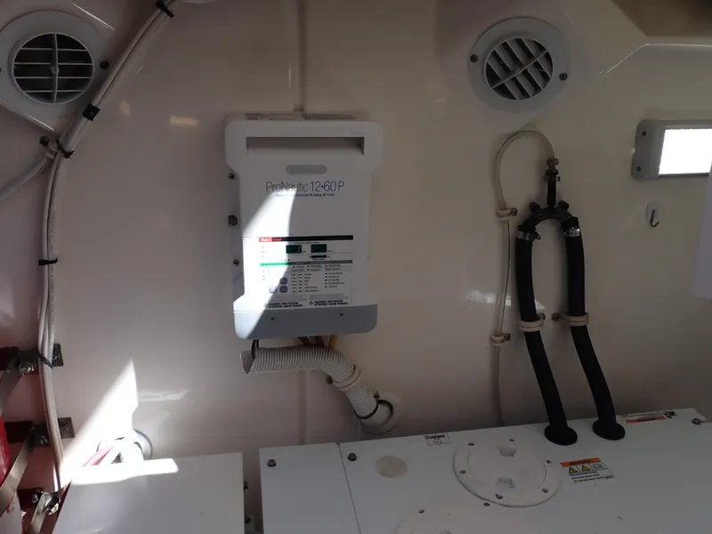 Slide: The Image of Engine room of 2009 Tiara Yachts 4300 Sovran with ProNautic 12-60P charger. - 18