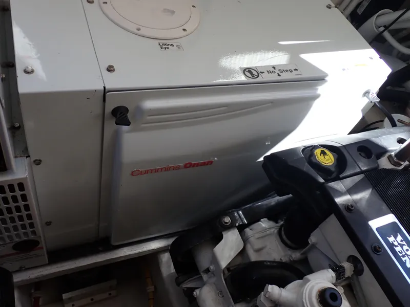 Slide: The Image of Engine compartment of 2009 Tiara Yachts 4300 Sovran with Cummins Onan generator. - 19