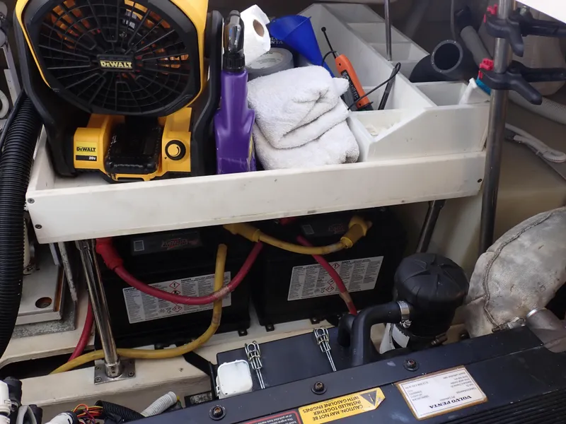 Slide: The Image of Storage compartment in a 2009 Tiara Yachts 4300 Sovran with tools and equipment. - 20